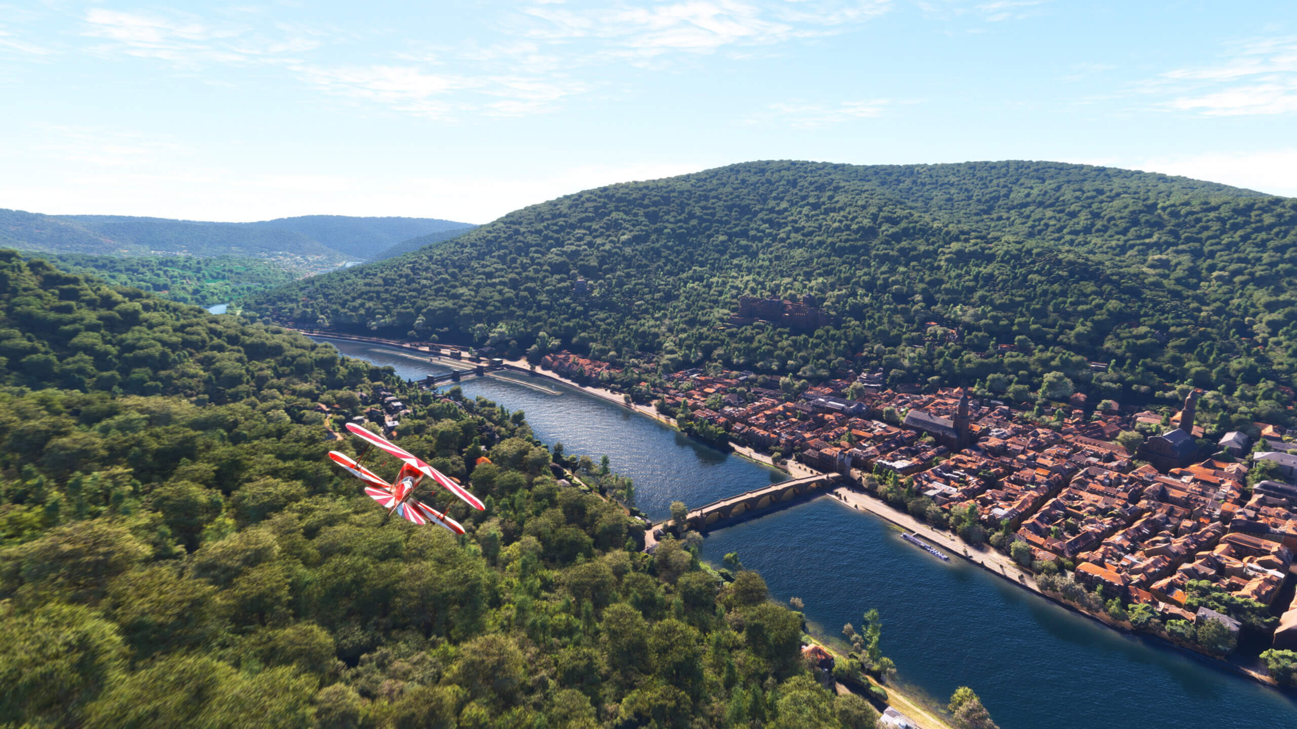 A Pitts Special flies over a river in Germany.