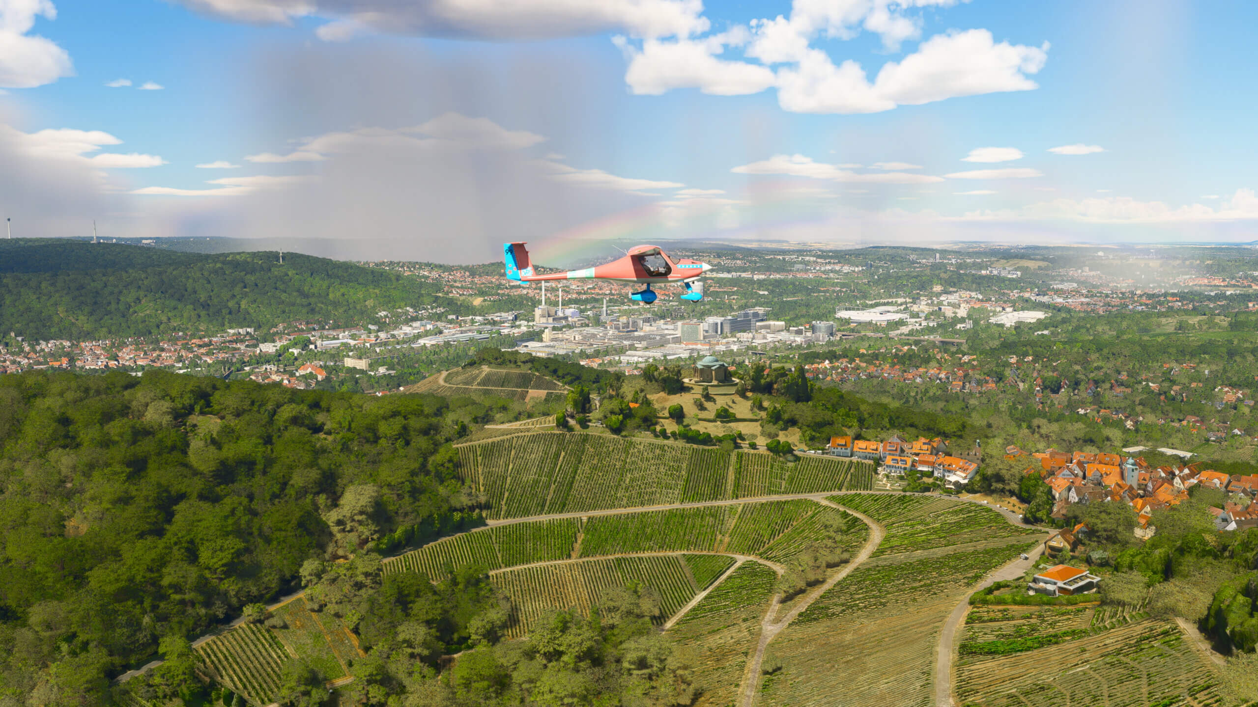 A Pipistrel Virus flies over a German town.