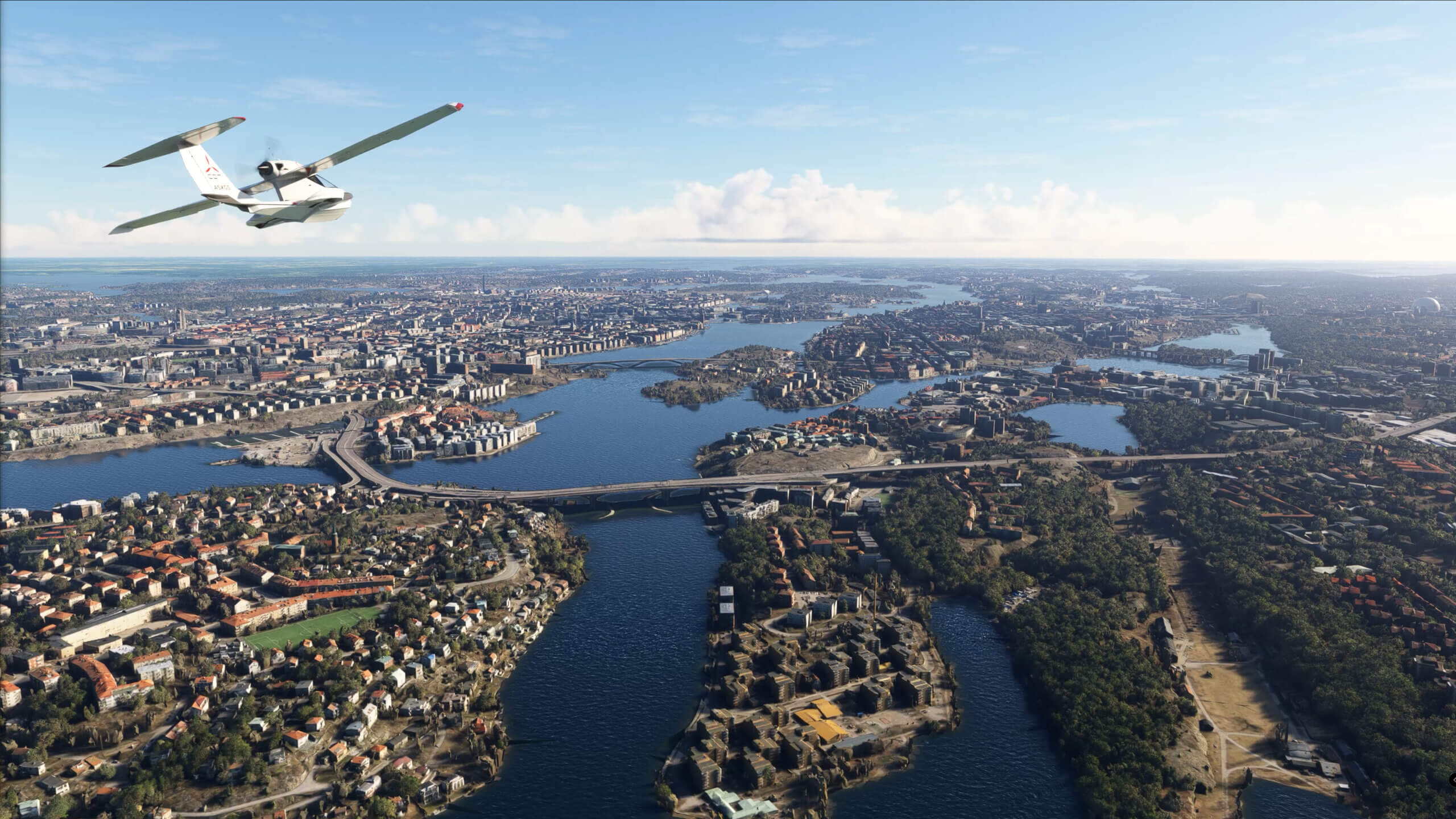 An ICON A5 flies over Stockholm