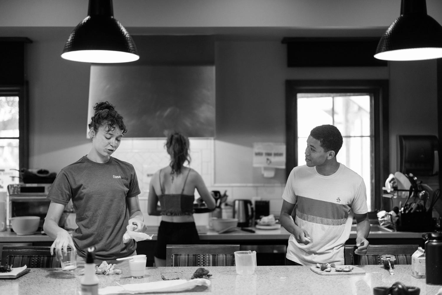 Image of Diego making crepes with his roommates.