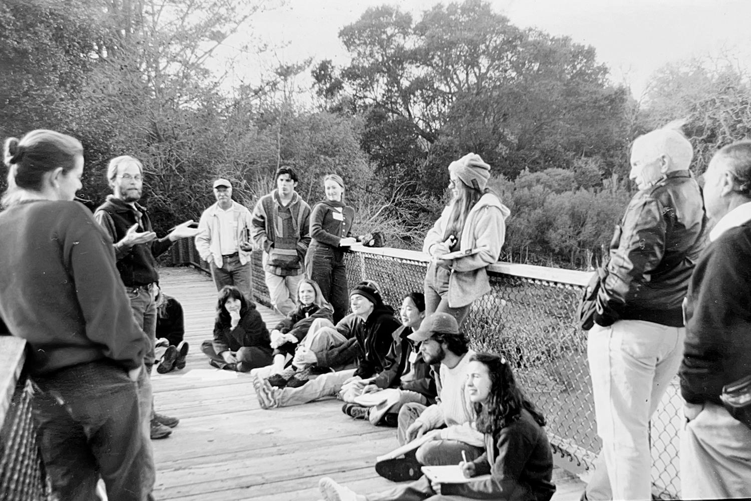 Image of docent Gary Kittleson talking to a group of students.
