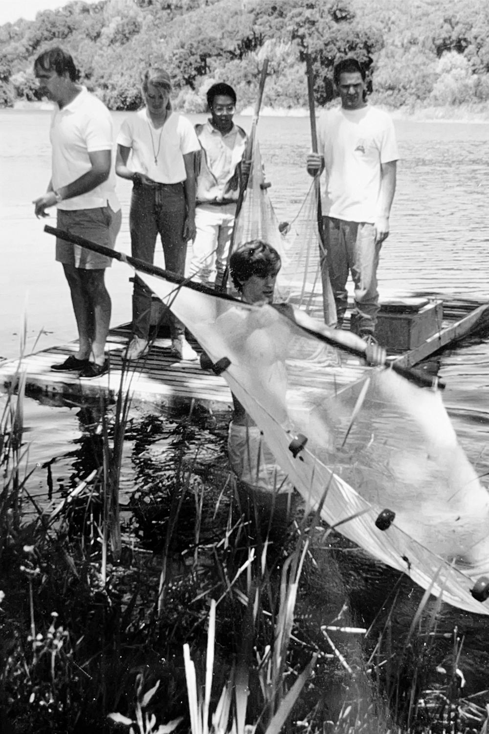 Image of docents on a makeshift raft.