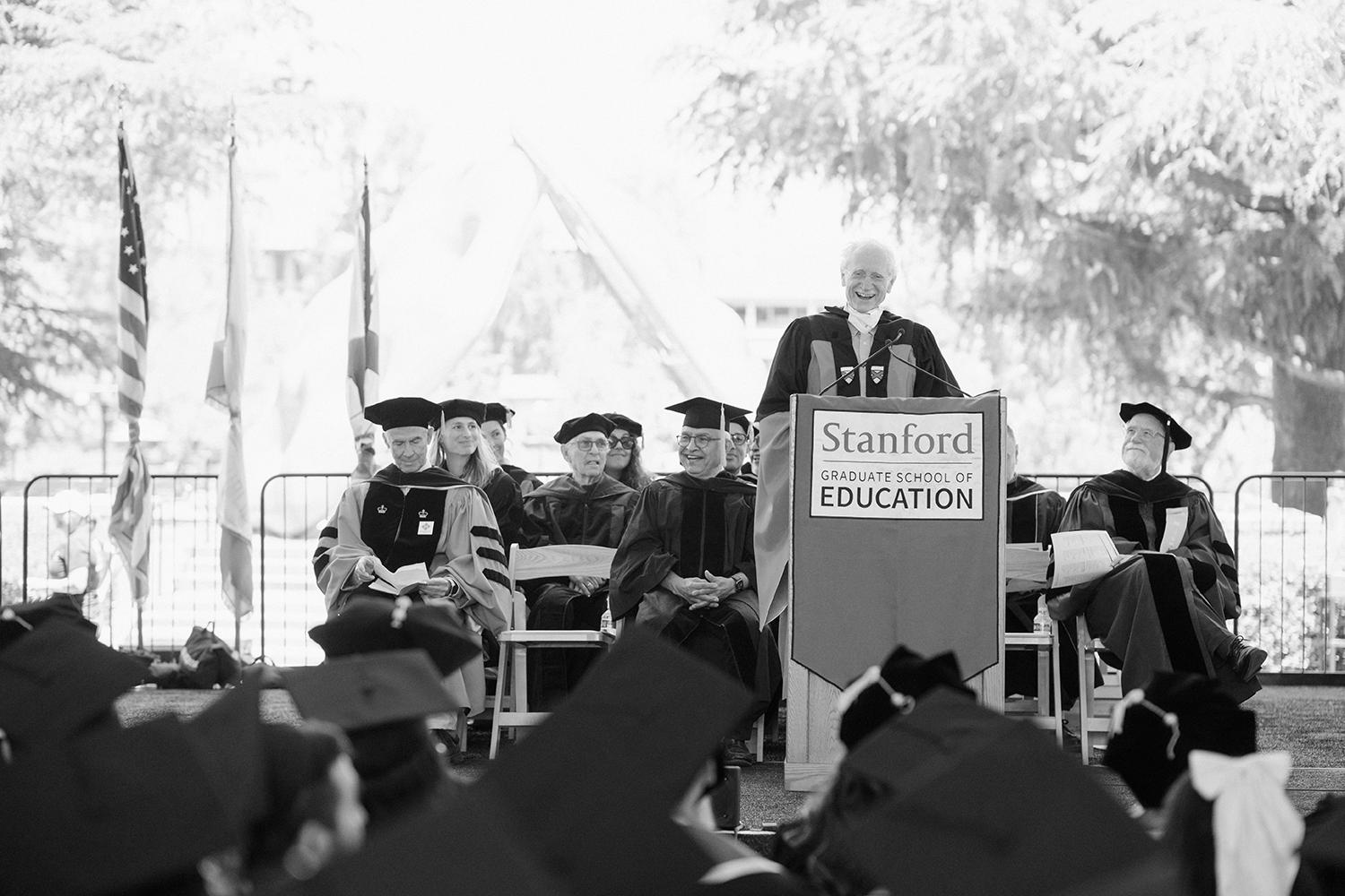 Image of Professor Emeritus Decker Walker delivering the commencement address.