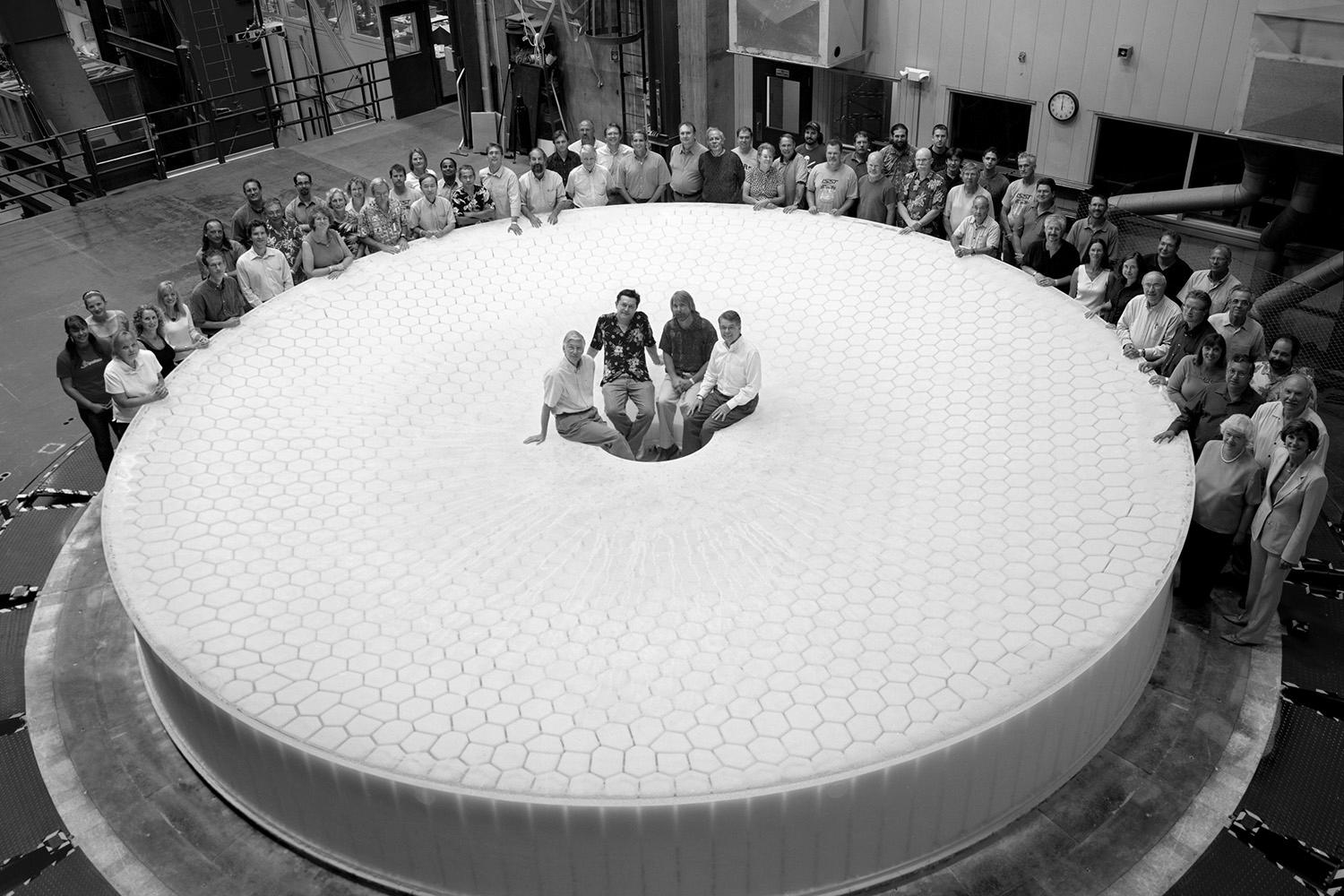 A group photo of members of the team building the LSST.