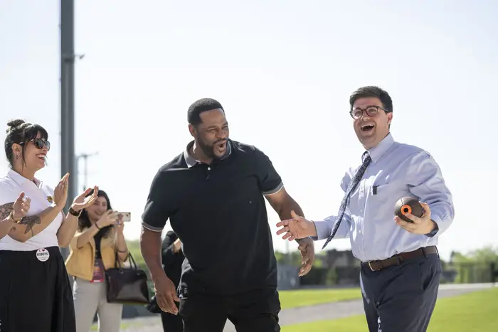 Corey O'Connor catches a football outside of the RIC.