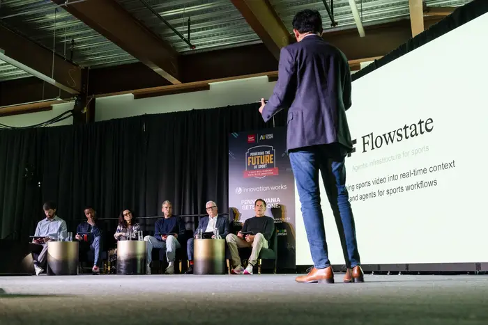 Flowstate presents onstage.