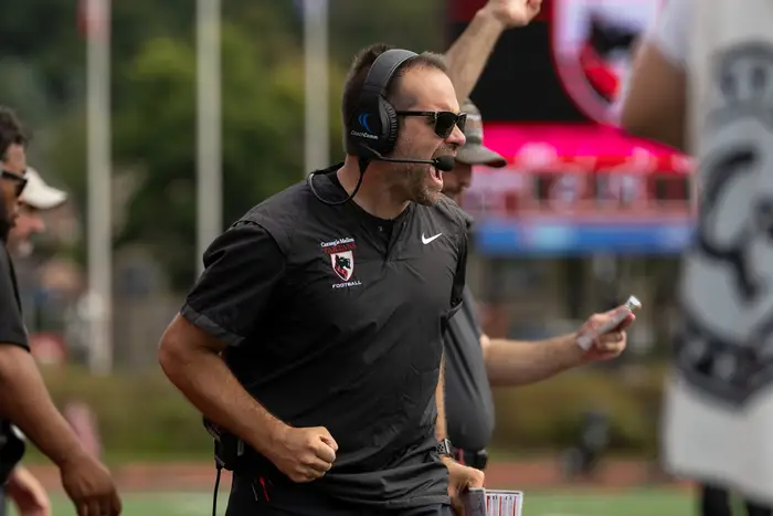 Coach Larsen shouting from the sideline